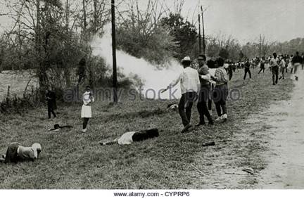 http://l7.alamy.com/zooms/1fd773d7dcbc461b946f5d9480b0a80f/civil-rights-demonstrators-scatter-after-police-throw-smoke-bombs-cyprp6.jpg